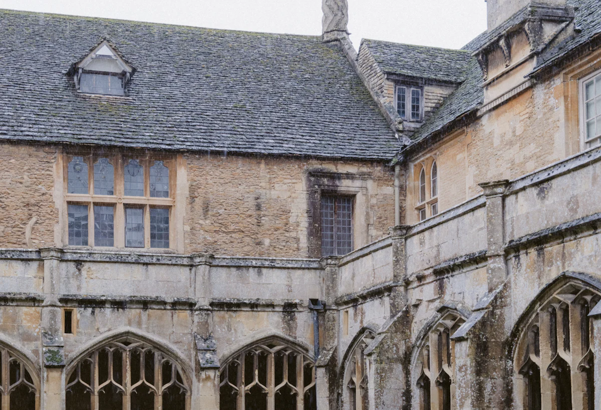 Arched stone windows of a historic institutional building