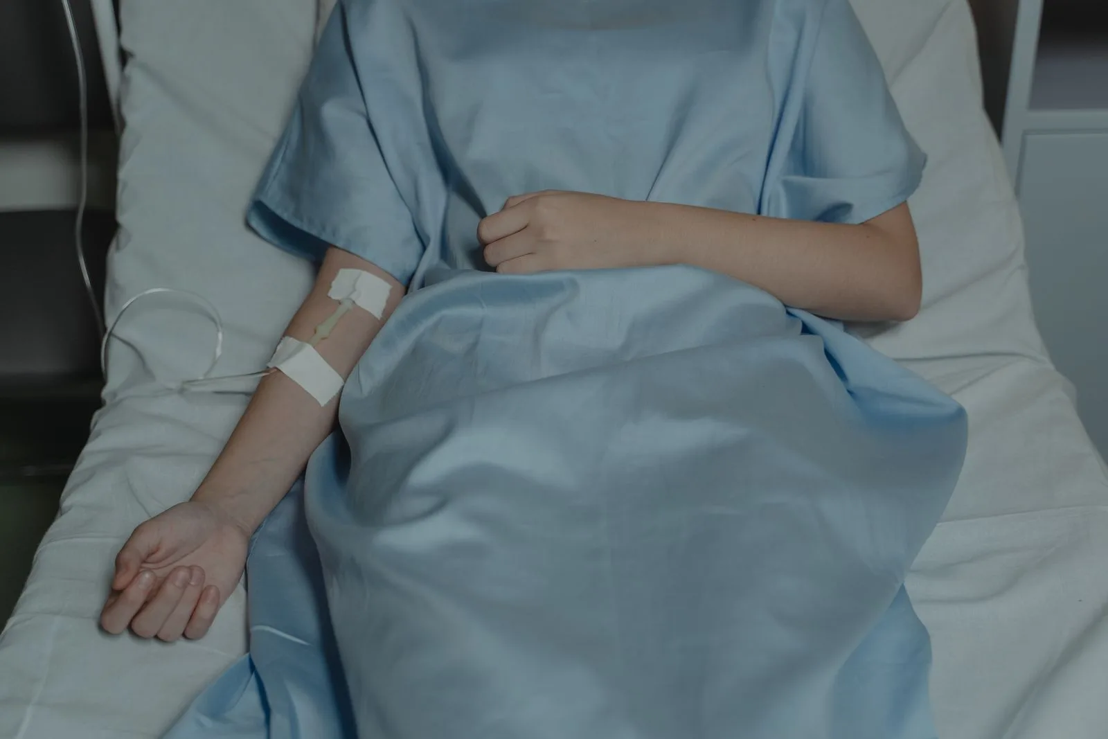 Sepsis expert witness — A hospital patient receiving intravenous treatment