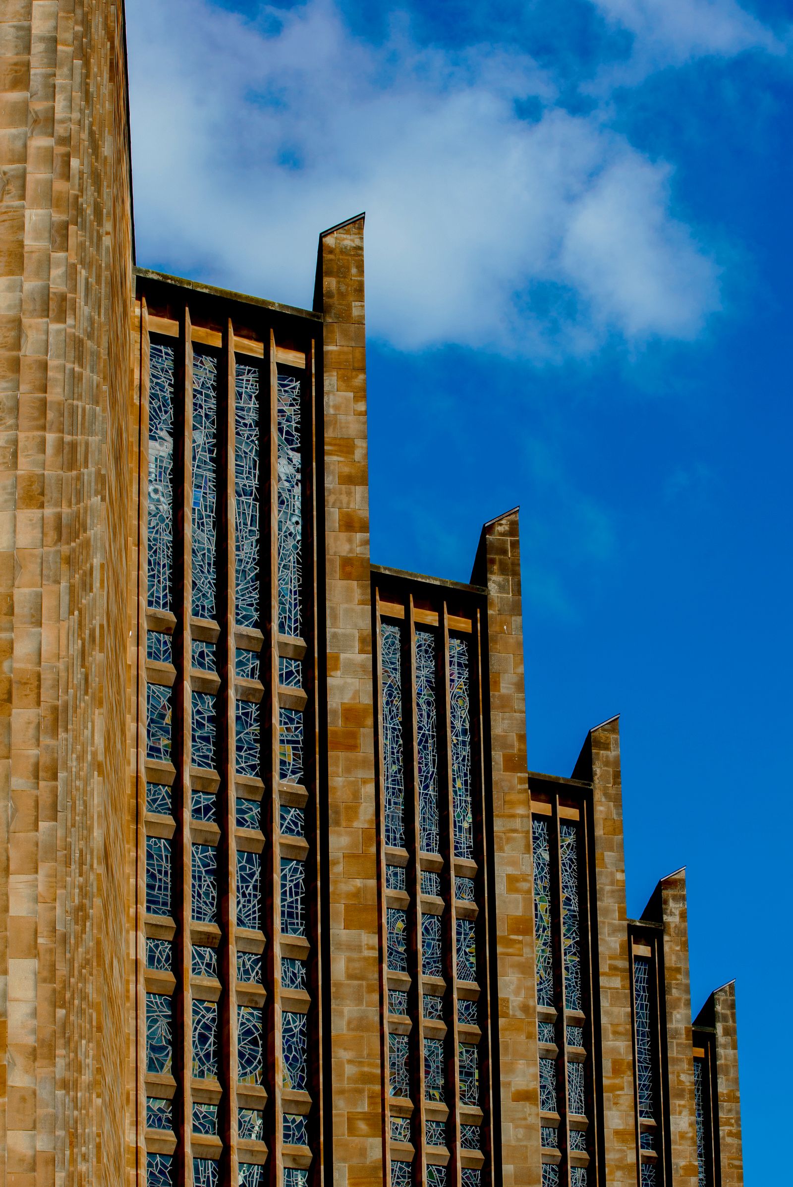 Coventry Cathedral against a blue sky