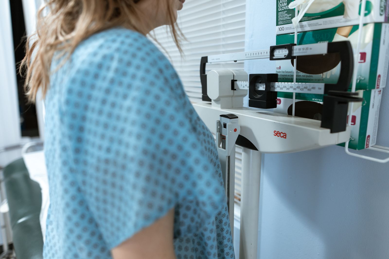 Patient being weighed on a clinical scale, part of the assessment clinical nutrition expert witnesses review