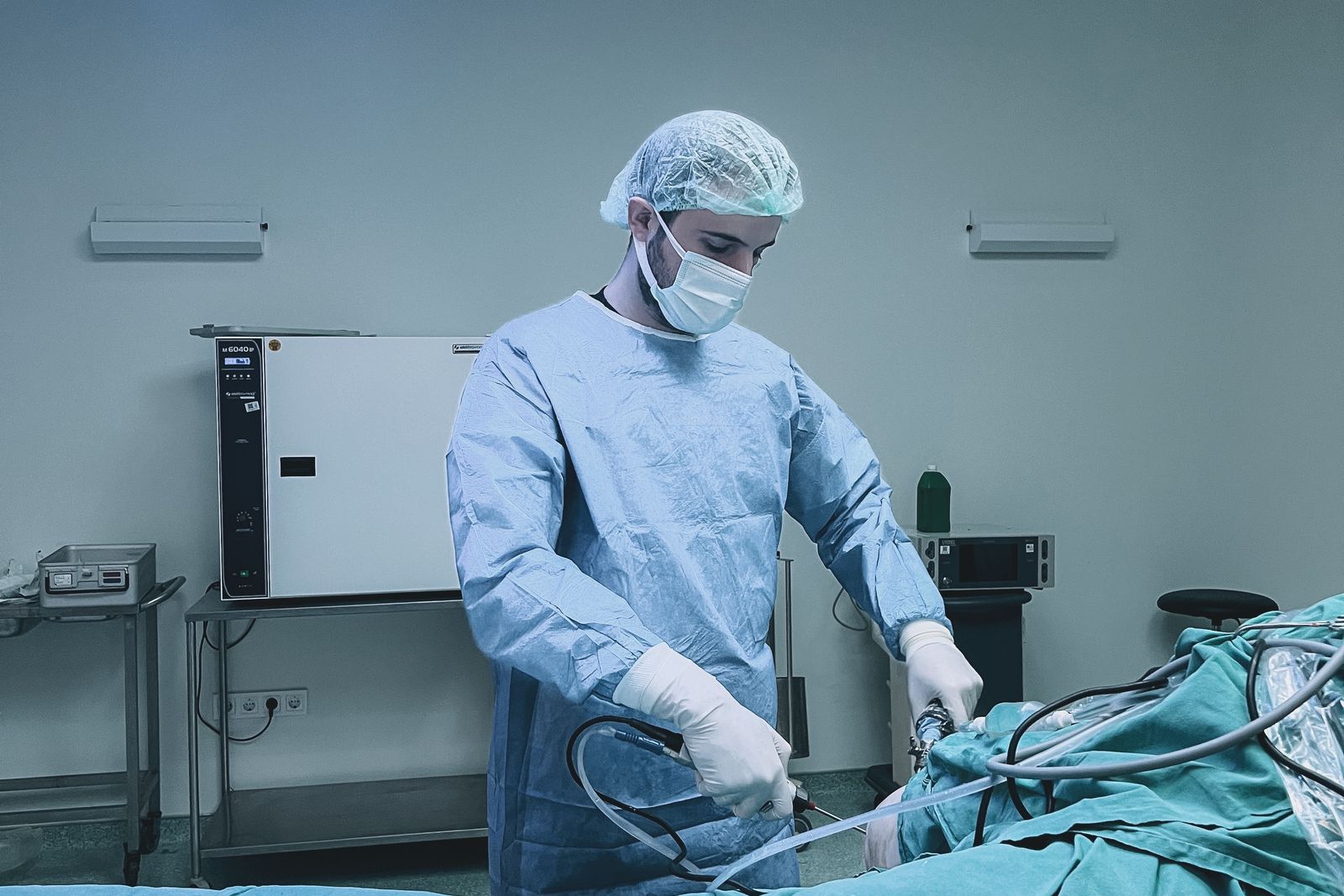 Clinician performing an endoscopic procedure, the practice gastroenterology expert witnesses examine