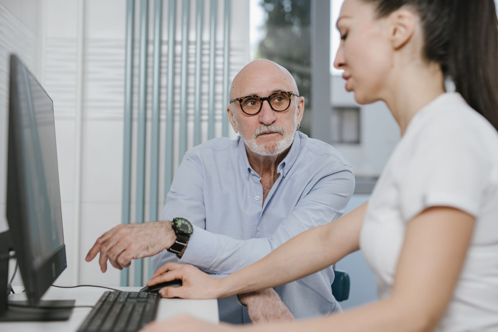 Older patient in consultation with a clinician, the care geriatric medicine expert witnesses assess