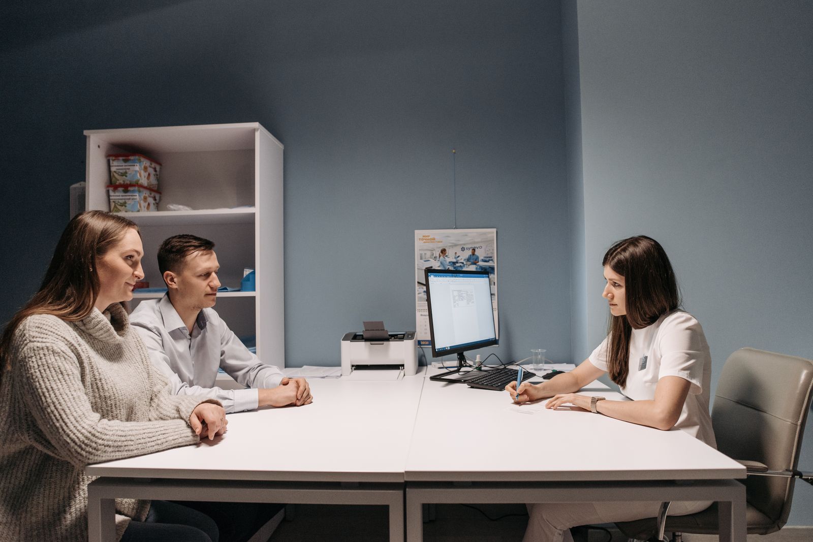 Couple in consultation at a fertility clinic, the setting infertility expert witnesses describe