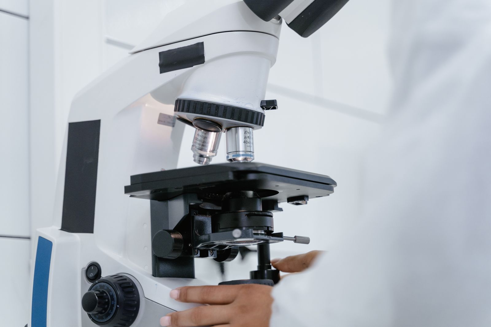 Laboratory microscope used in cytogenetic analysis, the work medical genetics expert witnesses explain