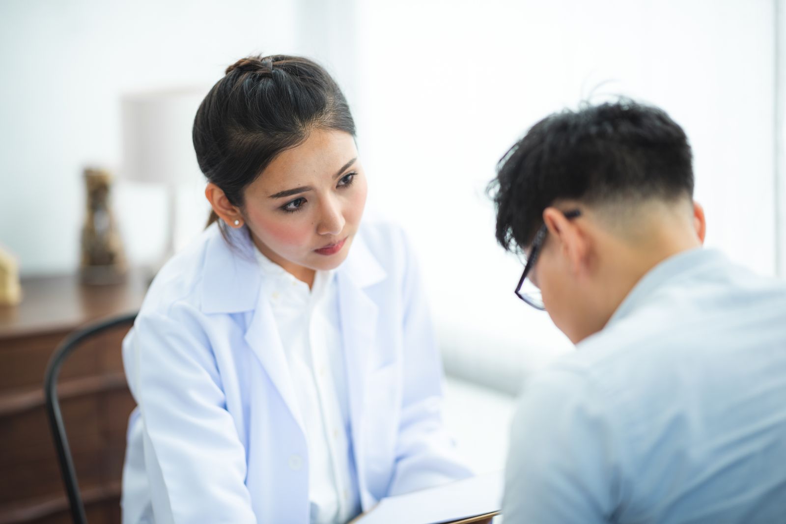 Clinician in a discreet consultation, the setting sexual health expert witnesses describe