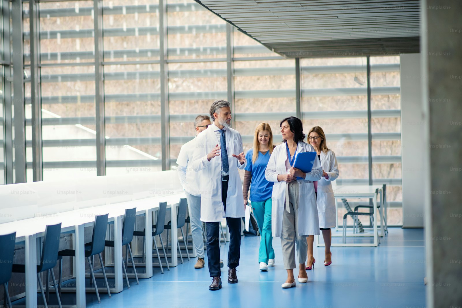 Clinical staff in a hospital corridor, the organisational setting healthcare expert witnesses describe