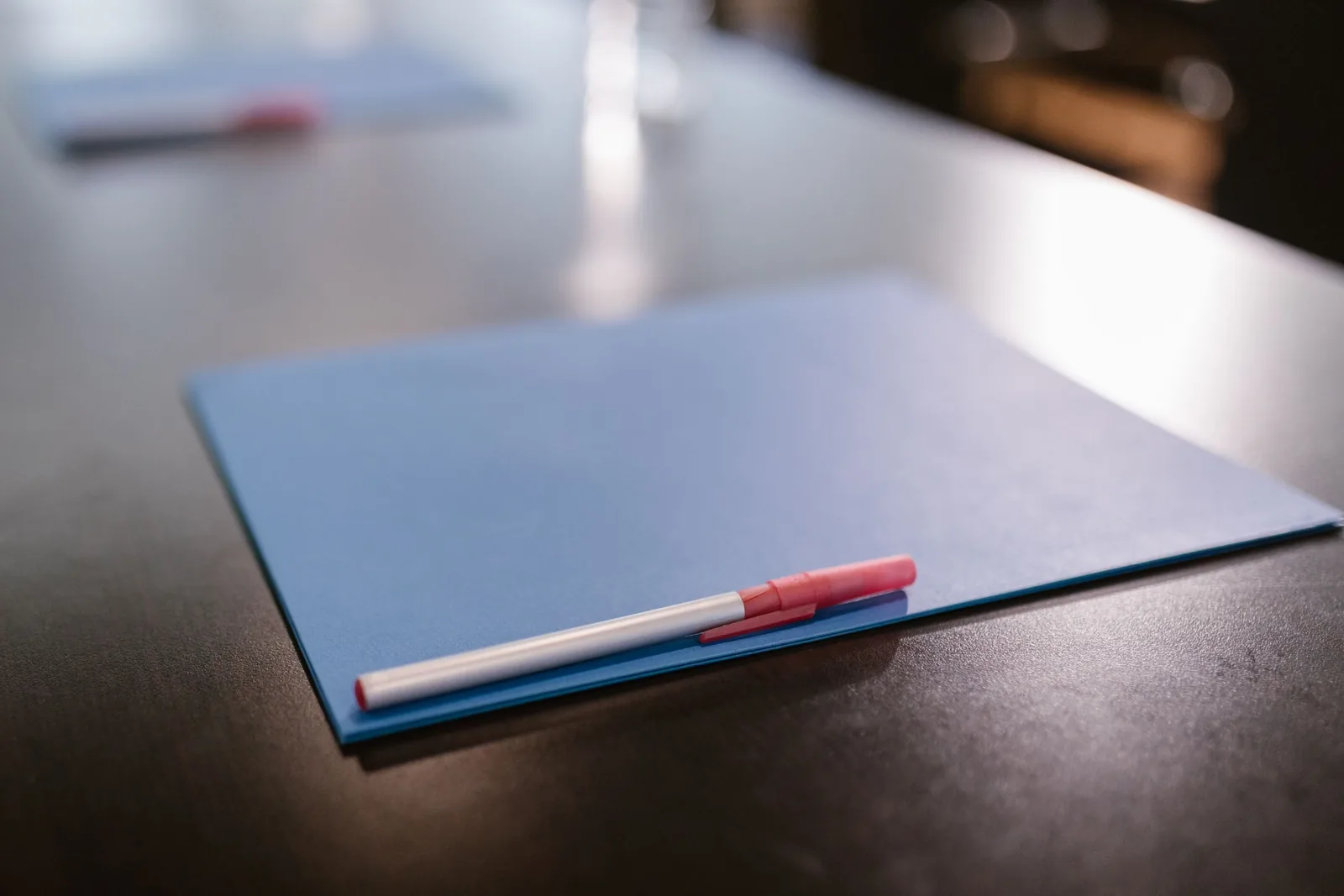 Capacity assessment report — a clinician taking notes during an assessment interview